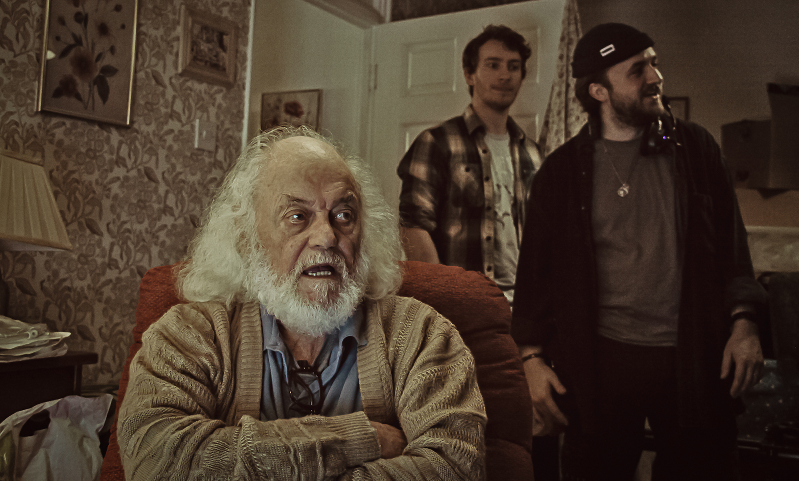 Three men on set